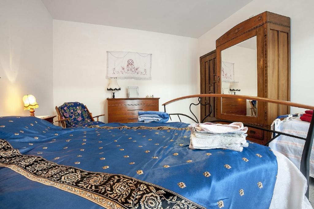 A bed or beds in a room at Passiflora House - Basilicata