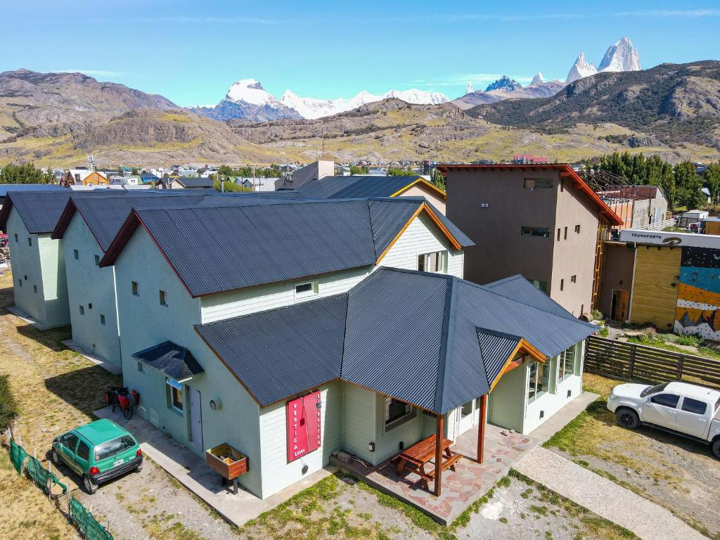 an overhead view of a house with a black roof at Hostería Vertical Lodge in El Chalten