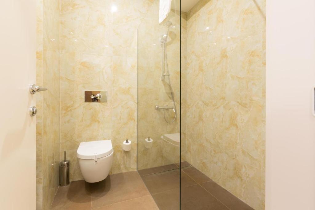 Koupelna v ubytování Hotel City Savoy