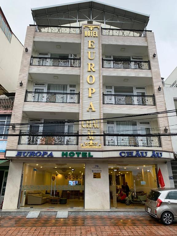a building with a sign that reads hotel laocoön at Europa Hotel in Da Lat