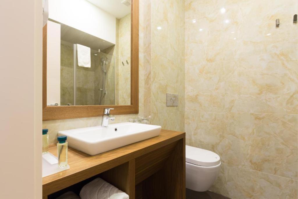 Koupelna v ubytování Hotel City Savoy