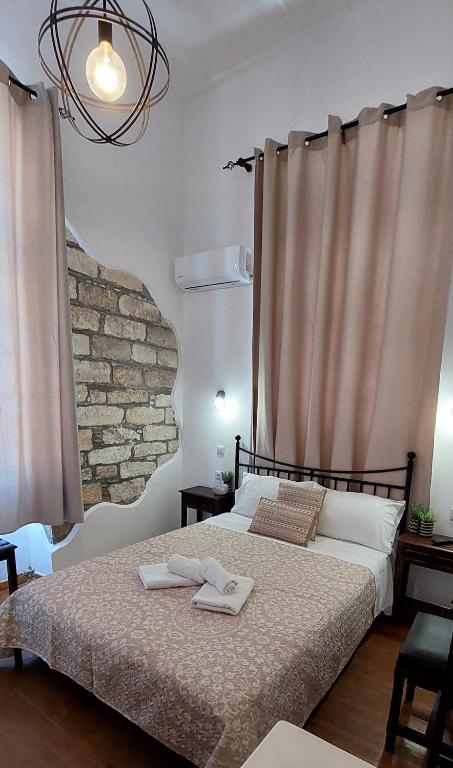Postel nebo postele na pokoji v ubytování Casa di Syrii
