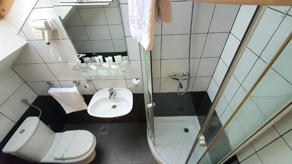 Koupelna v ubytování Deluxe Nortel Hotel