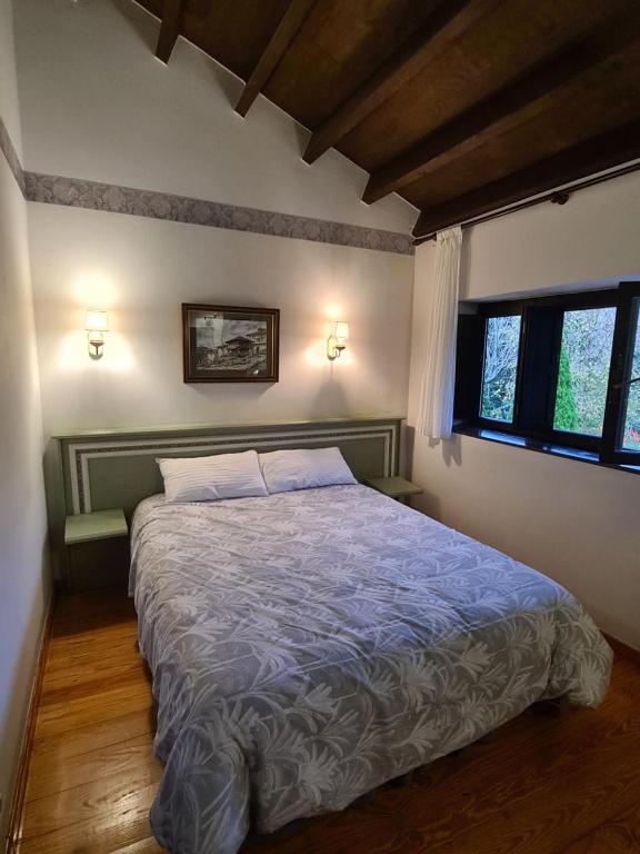 Postel nebo postele na pokoji v ubytování Amaicha Casona