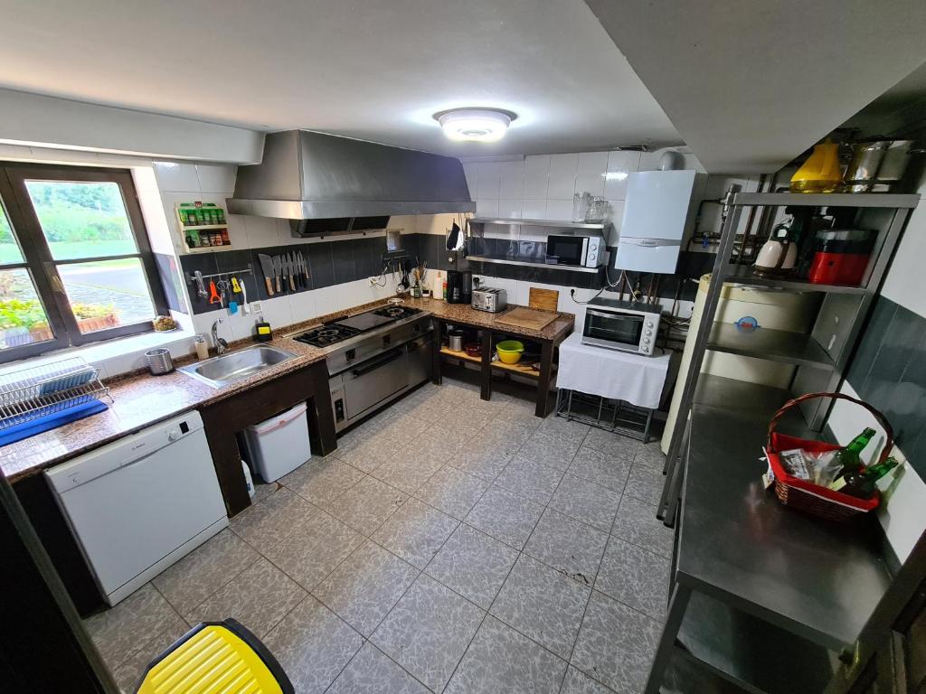 Kuchyň nebo kuchyňský kout v ubytování Amaicha Casona