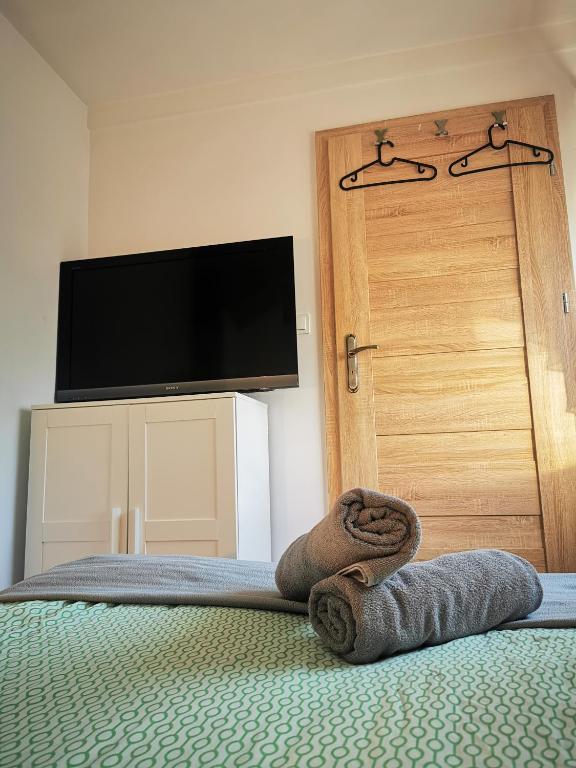 Postel nebo postele na pokoji v ubytování Hostel 55 - darmowy parking