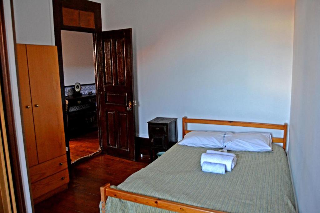 Postel nebo postele na pokoji v ubytování Guesthouse da Sé