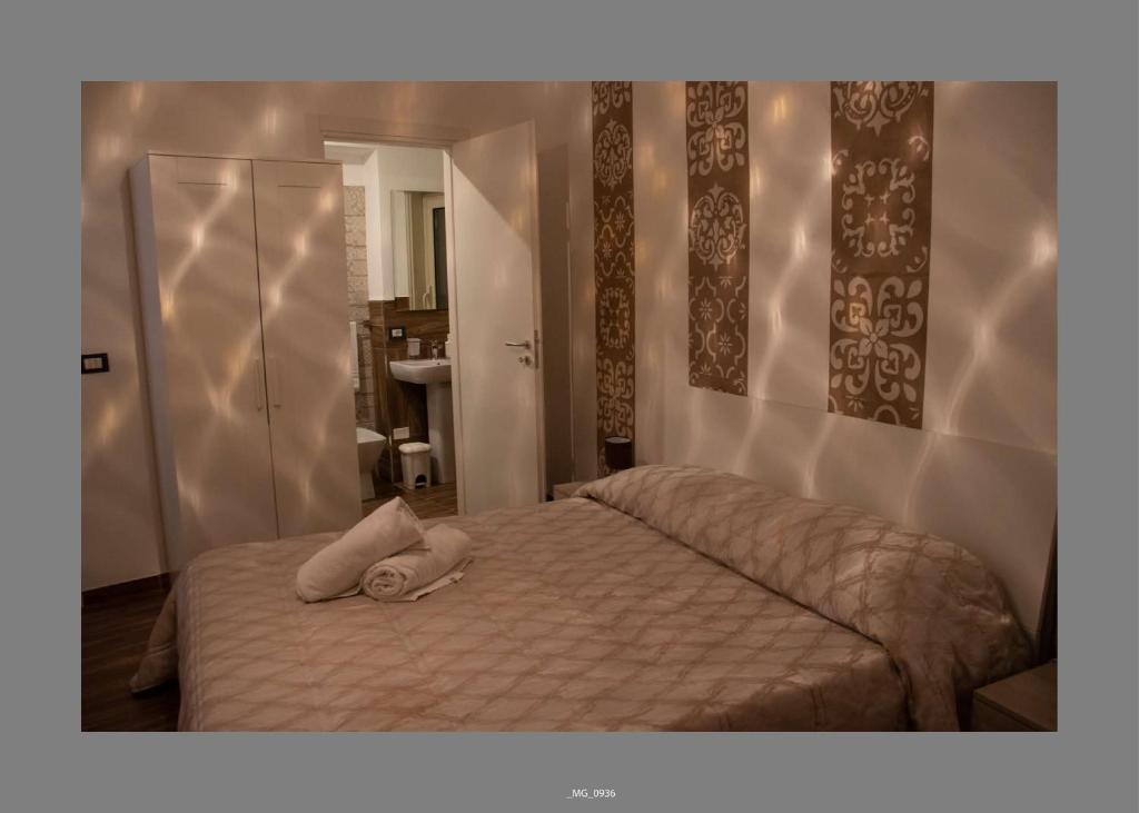 Postel nebo postele na pokoji v ubytování B&B Pastello