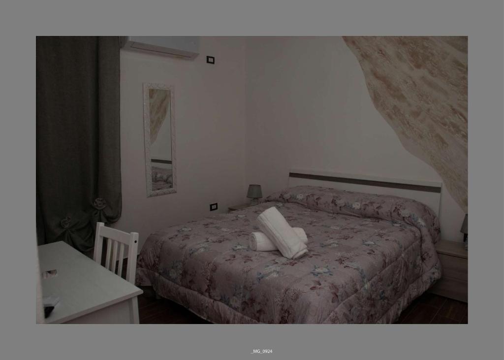 Postel nebo postele na pokoji v ubytování B&B Pastello