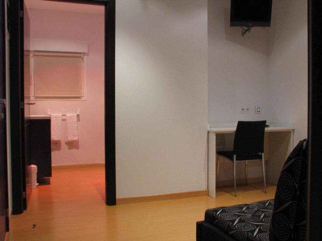 TV a/nebo společenská místnost v ubytování Hotel Elizalde
