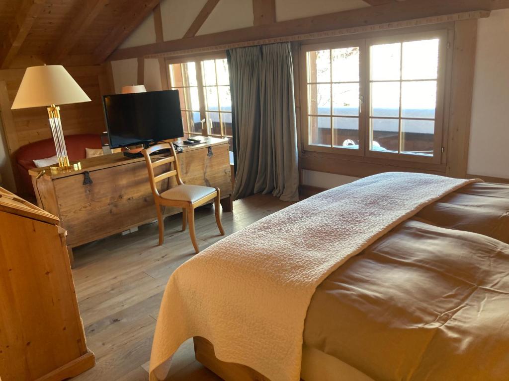 Postel nebo postele na pokoji v ubytování Hotel Alpenrose mit Gourmet-Restaurant Azalée