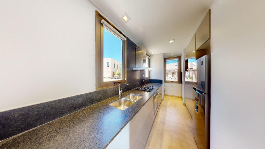 Kuchyň nebo kuchyňský kout v ubytování Liniers Green Apartments