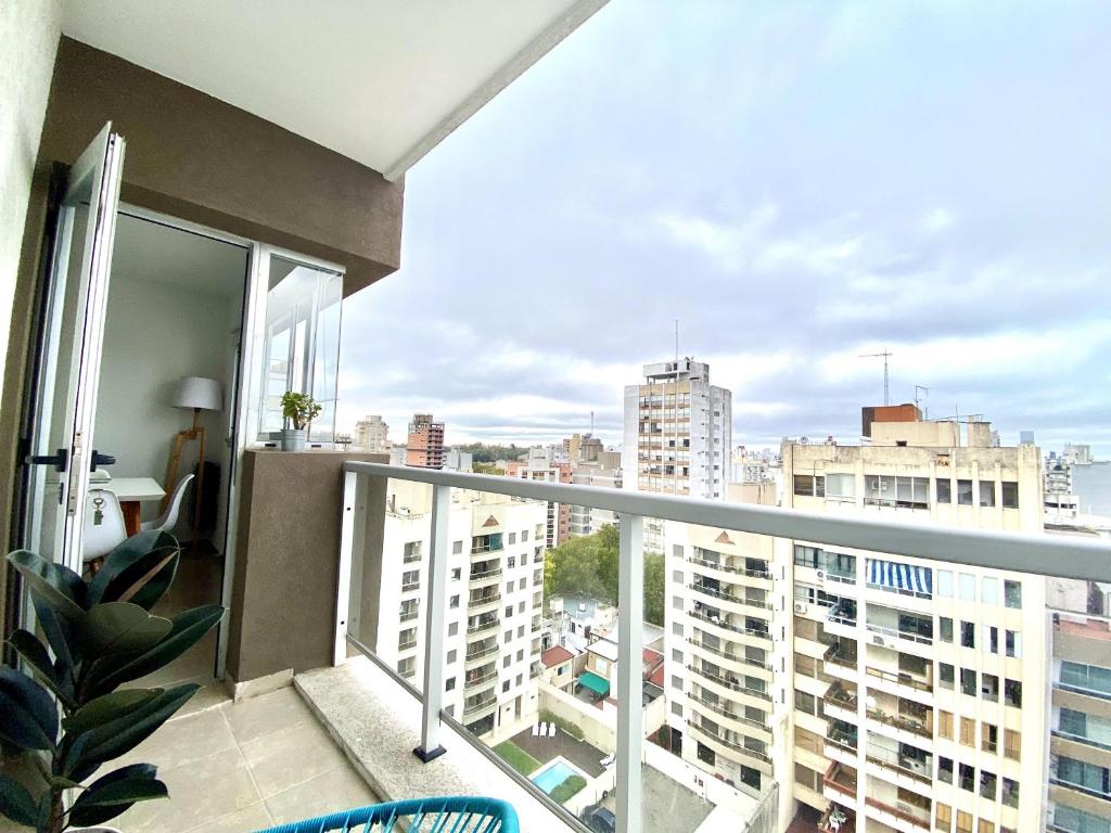 a balcony with a view of a city at Dpto luminoso excelente zona in La Plata