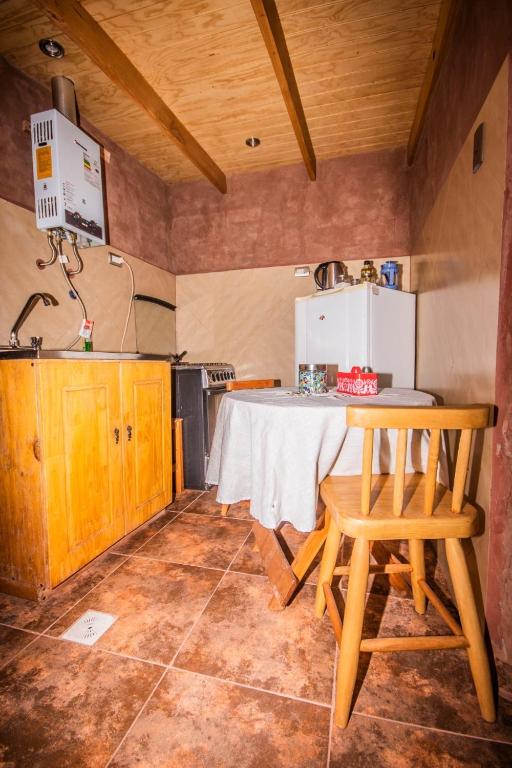 Kuchyň nebo kuchyňský kout v ubytování Incahuasi Travelodge