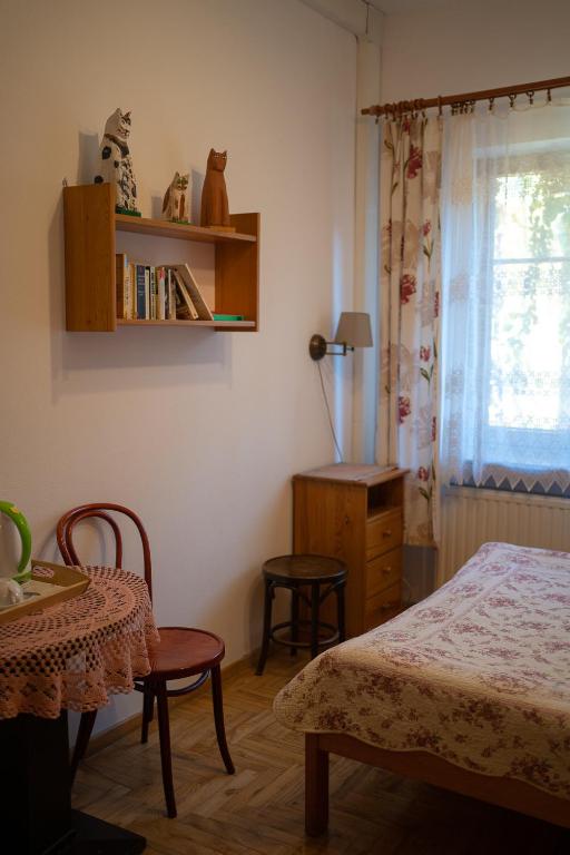 Postel nebo postele na pokoji v ubytování Kolory Guest House