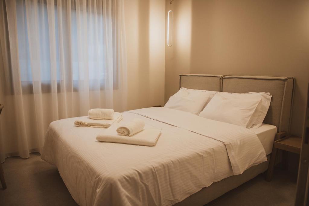 Postel nebo postele na pokoji v ubytování Plataria Sunrise Resort