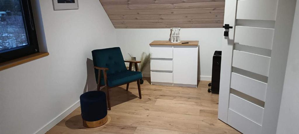 Kuchyňa alebo kuchynka v ubytovaní Sielanka Szkotowo domek z jacuzzi