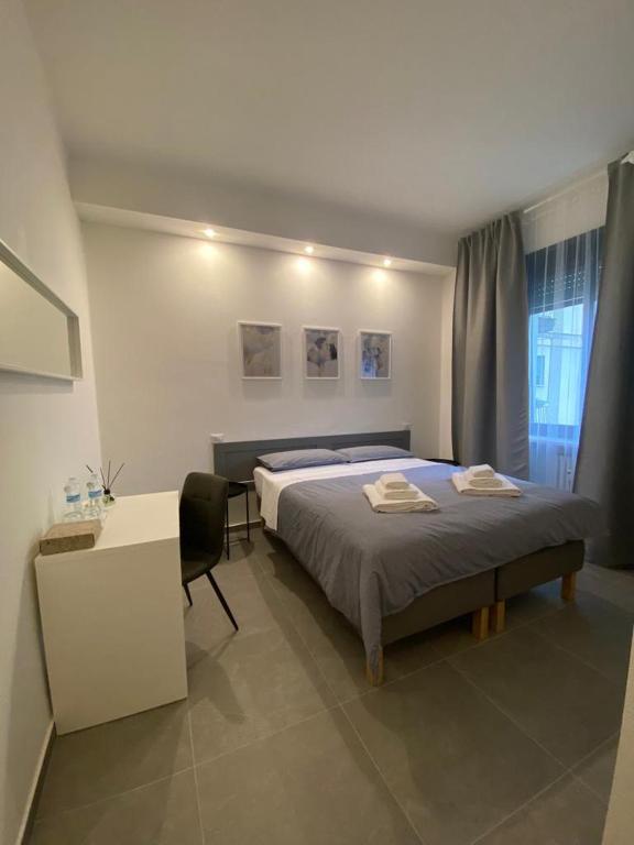 Postel nebo postele na pokoji v ubytování Residenza Via Verdi