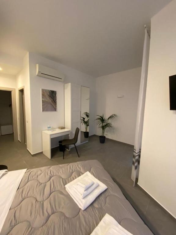 Postel nebo postele na pokoji v ubytování Residenza Via Verdi