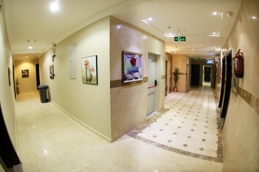 TV a/nebo společenská místnost v ubytování فندق المربع السابع Seventh Square Hotel