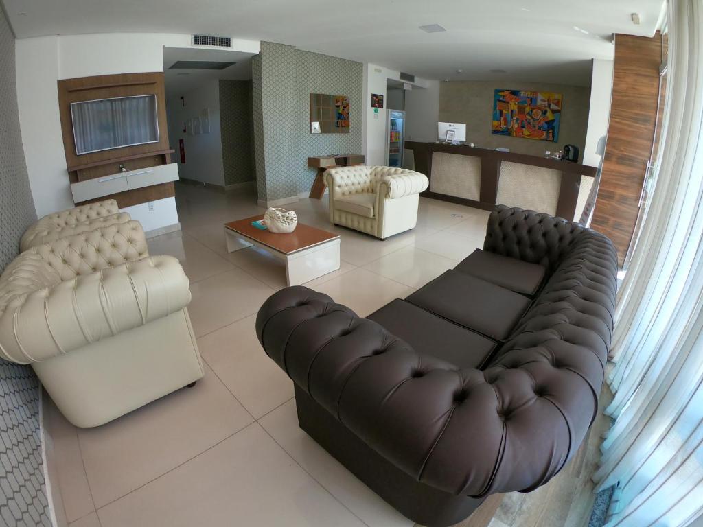 Uma área de estar em Tambau Beach Hotel