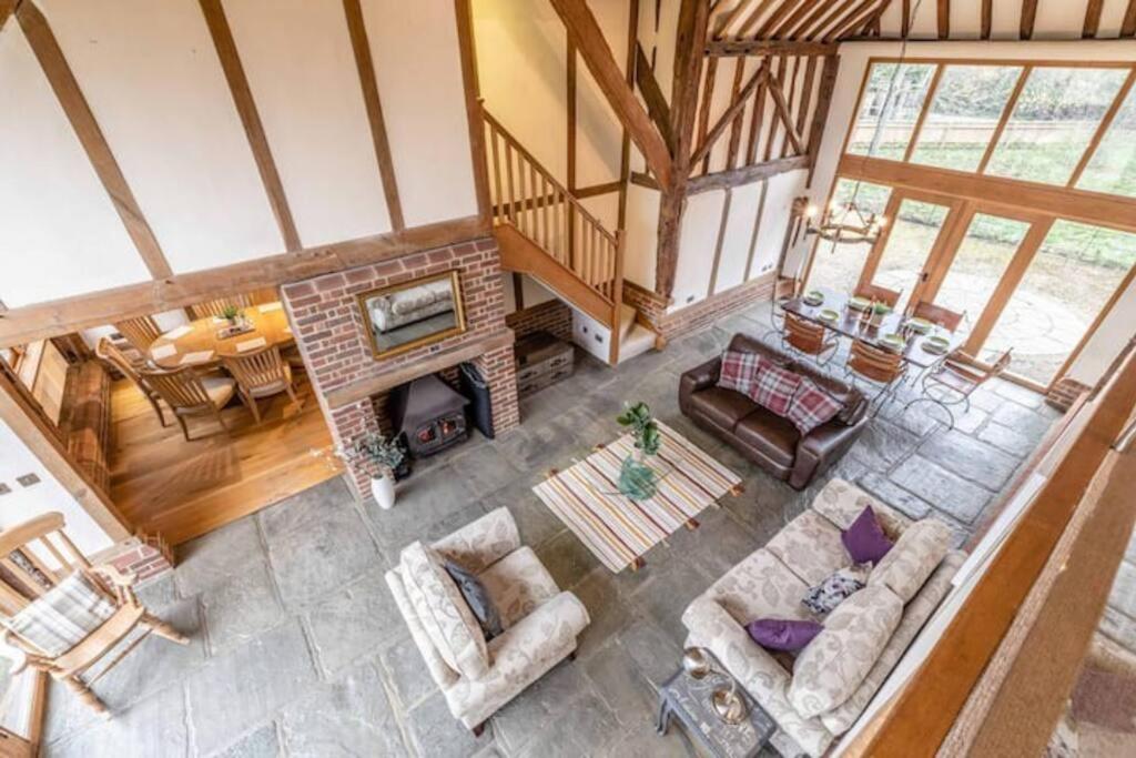 an overhead view of a living room with a fireplace at Family Friendly Retreat Dorney,Windsor in Buckinghamshire