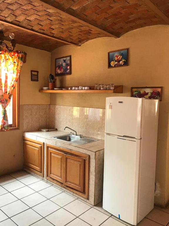 Kuchyň nebo kuchyňský kout v ubytování Cabañas Lupita