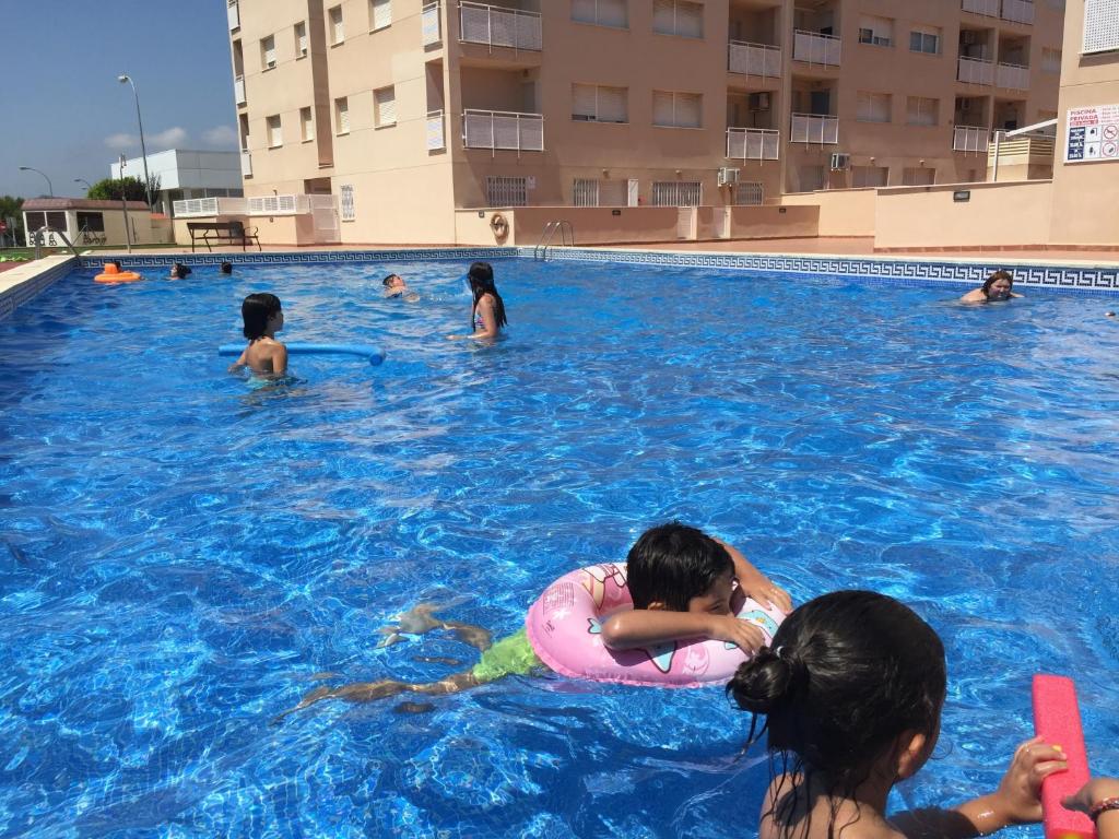 Bazén v ubytování Playa, Port Aventura, Golf, wifi y Parking nebo v jeho okolí