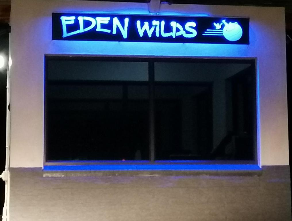 a sign for an eden wales gas station at Eden Wilds Hawk-in in Port Edward
