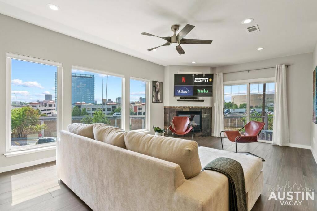 a living room with a couch and a fireplace at Enjoy DT In A Newly Renovated Home Covered Patio in Austin