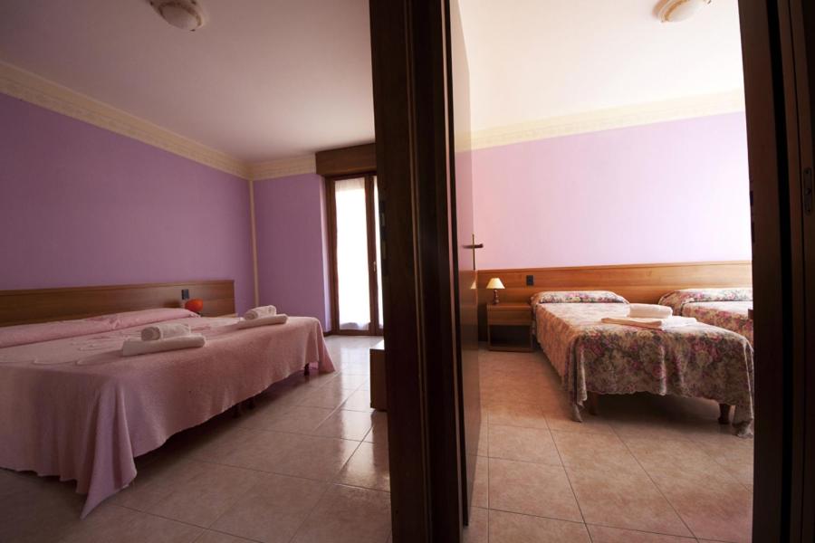 Postel nebo postele na pokoji v ubytování Hotel St. Antony