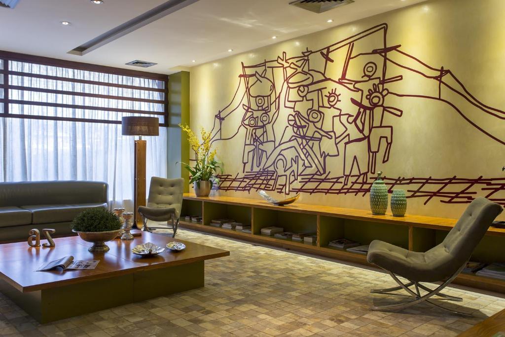 Uma área de estar em Black Stream Hotel