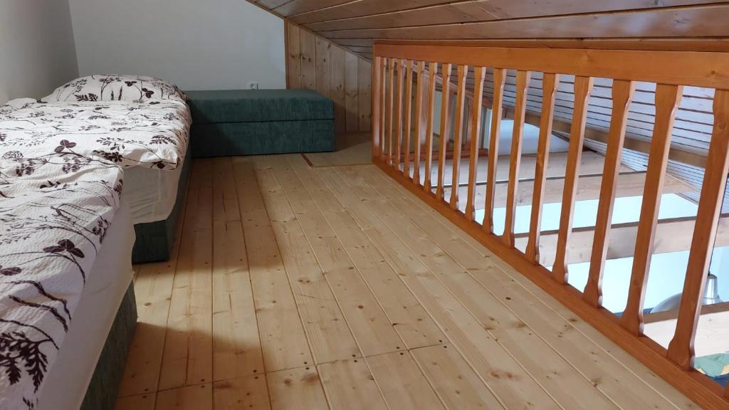 Łóżko lub łóżka w pokoju w obiekcie Chalupa a apartmány Marika