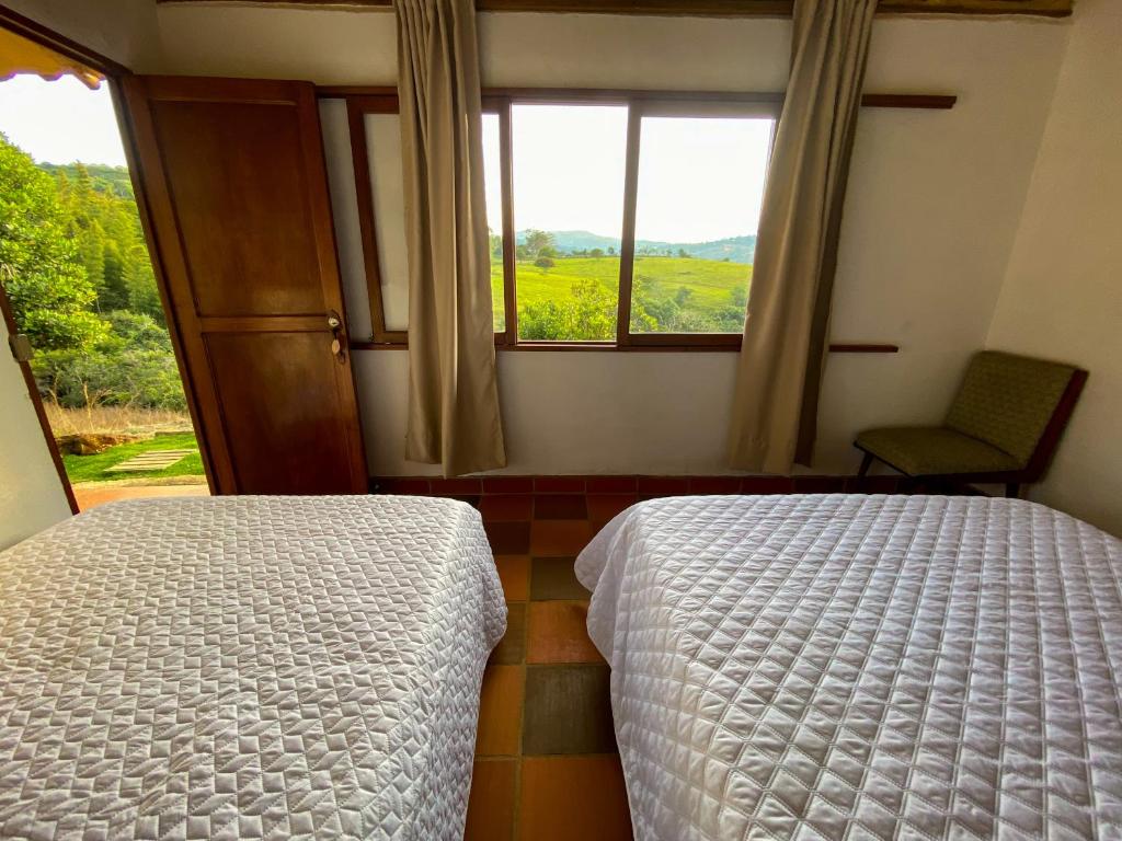 Postel nebo postele na pokoji v ubytování Campo Karst, Hospedaje y Campamento de montaña