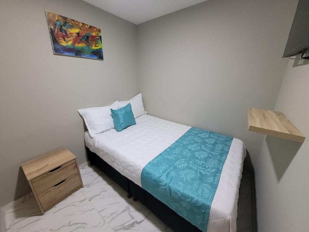 Postel nebo postele na pokoji v ubytování HOTEL LUXEM