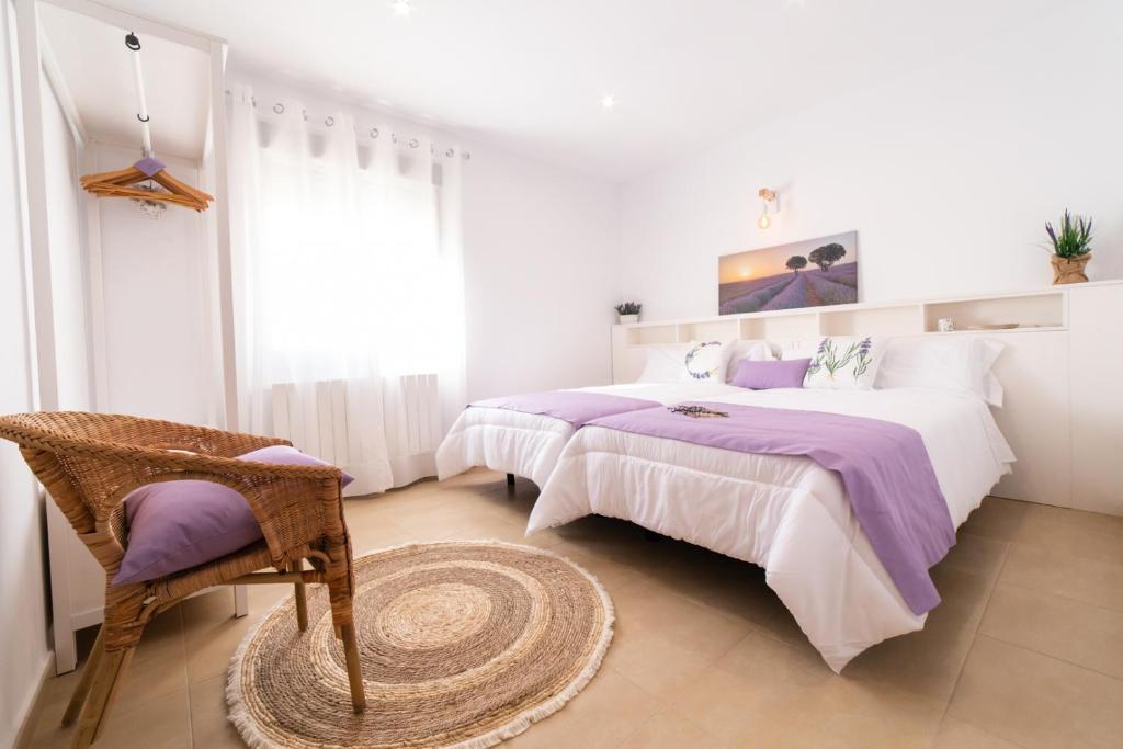 A bed or beds in a room at Apartamentos Turísticos Casa Morocho