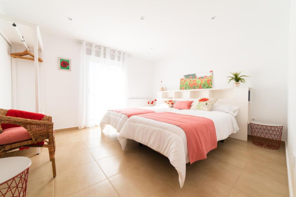 A bed or beds in a room at Apartamentos Turísticos Casa Morocho