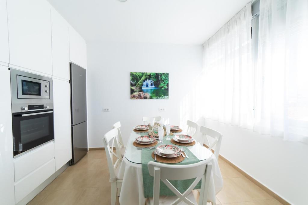 A kitchen or kitchenette at Apartamentos Turísticos Casa Morocho
