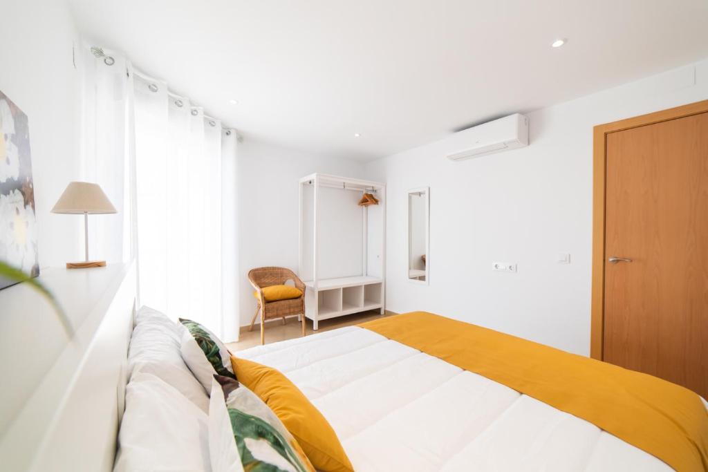A bed or beds in a room at Apartamentos Turísticos Casa Morocho