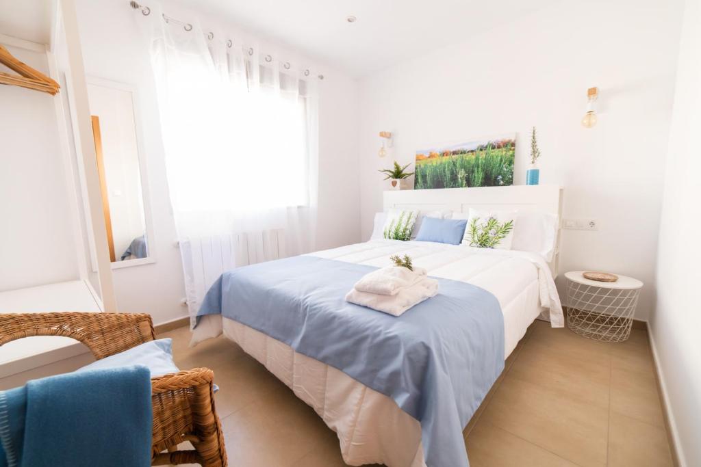 A bed or beds in a room at Apartamentos Turísticos Casa Morocho