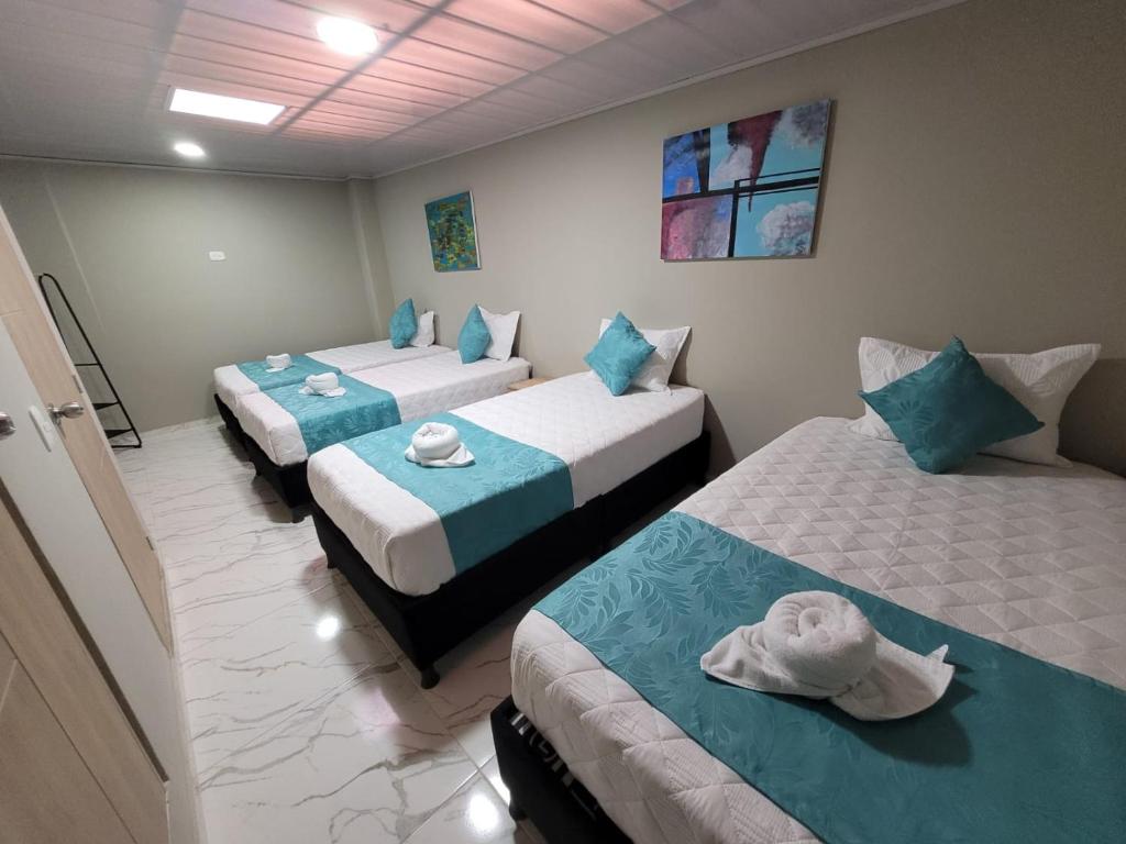 Postel nebo postele na pokoji v ubytování HOTEL LUXEM