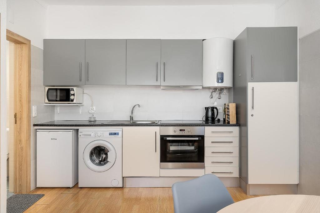 Kuchyň nebo kuchyňský kout v ubytování Vista Rio - apartamento