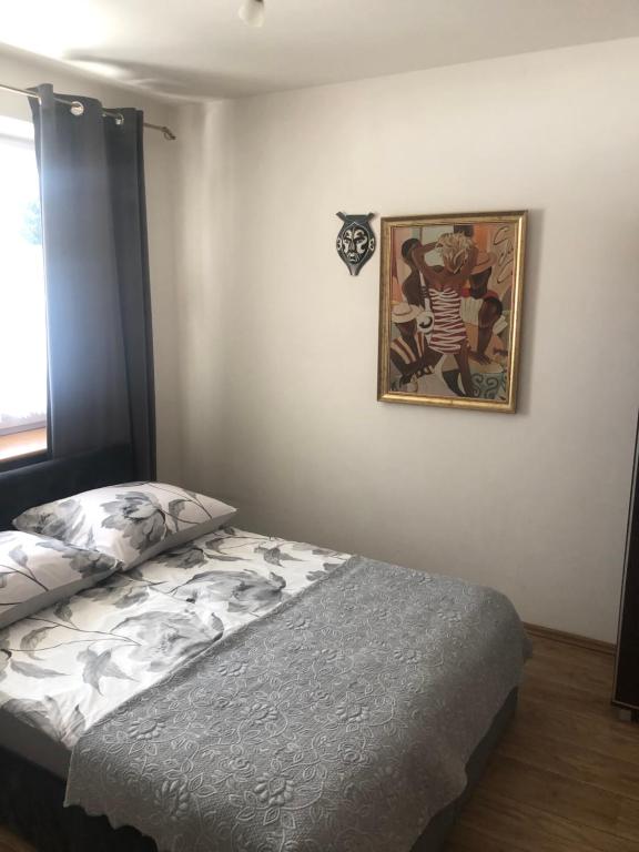 Posteľ alebo postele v izbe v ubytovaní Apartament Stroma 4