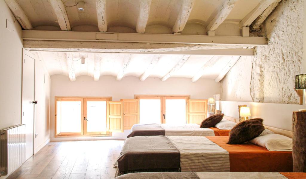 Posteľ alebo postele v izbe v ubytovaní Clauhomes Casa Rural Deluxe