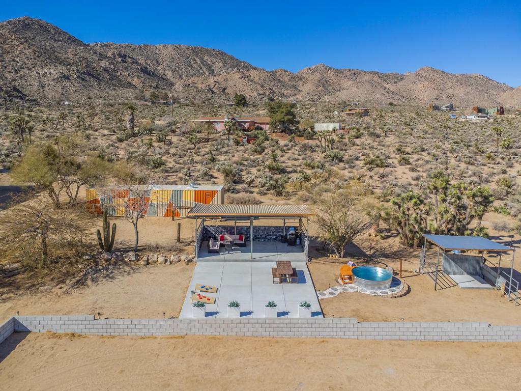 an aerial view of a house in the desert at Close to JT Park & Town w/360 View The Green Adobe in Joshua Tree