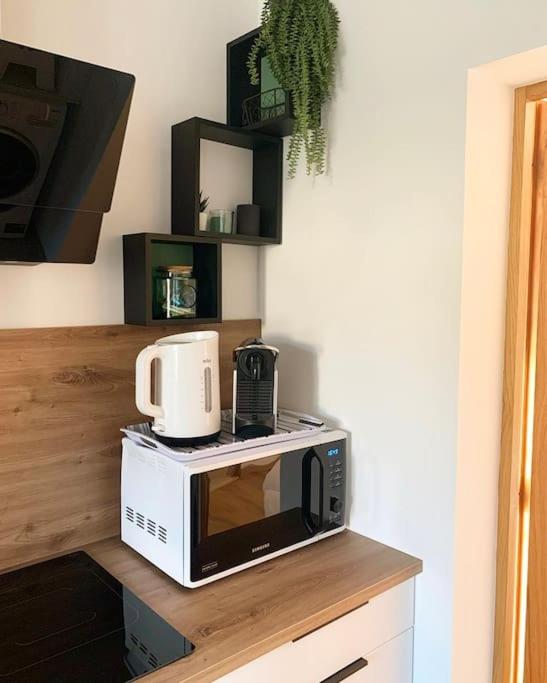 Kuchyňa alebo kuchynka v ubytovaní Maison climatisée toute équipée