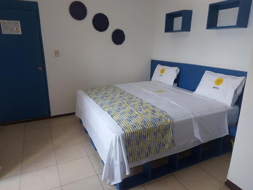 Postel nebo postele na pokoji v ubytování HOTEL INTI