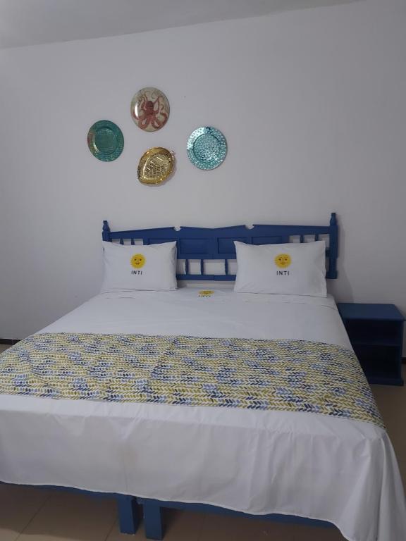 Postel nebo postele na pokoji v ubytování HOTEL INTI