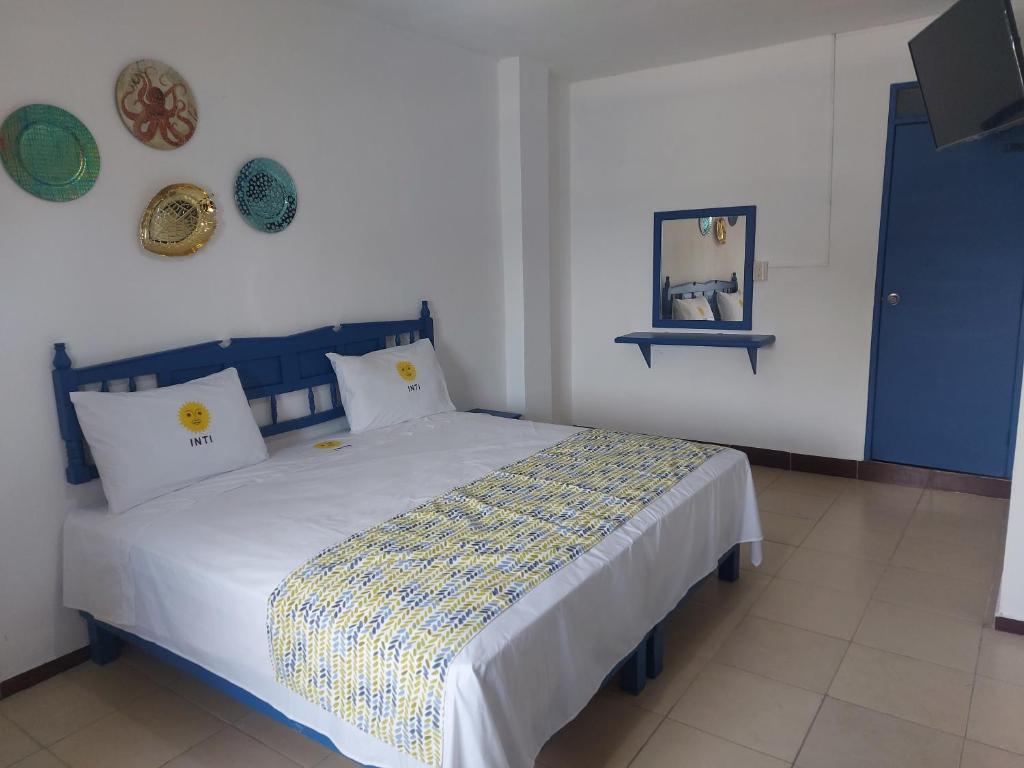 Postel nebo postele na pokoji v ubytování HOTEL INTI