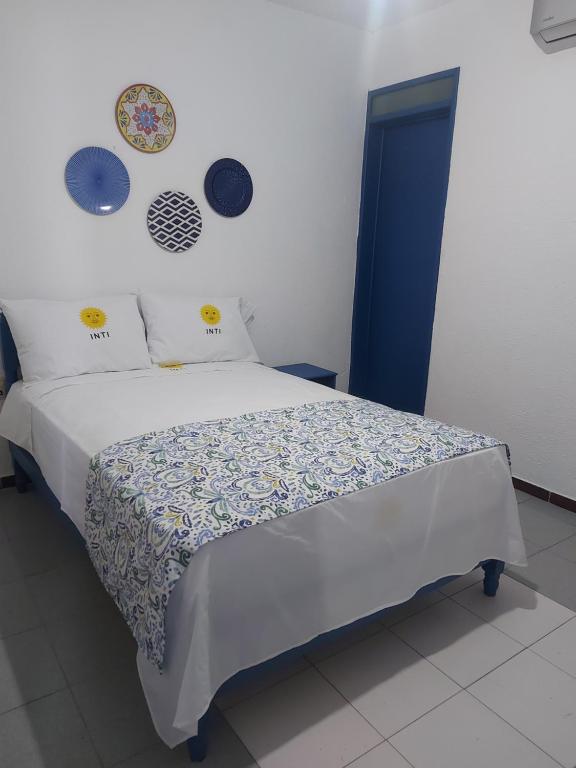 Postel nebo postele na pokoji v ubytování HOTEL INTI